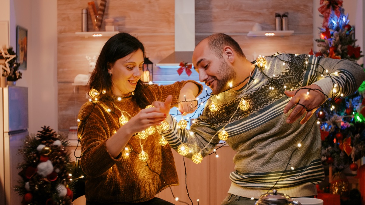 a-couple-reusing-two-sets-of-old-christmas-lights