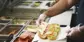 Employee Making Food Inside Restaurant