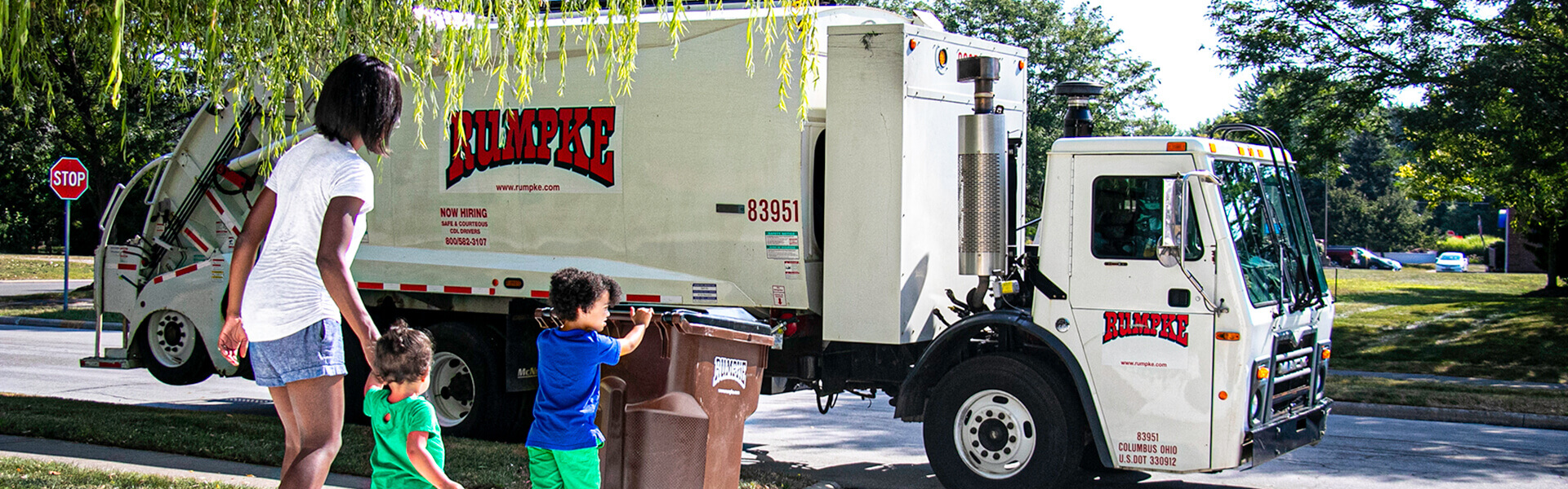 Rumpke Truck Collecting Waste From Local Community Customers