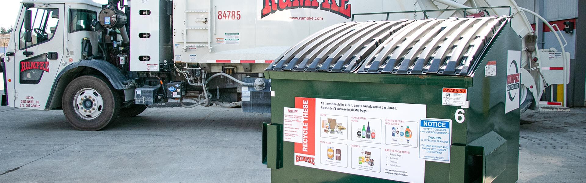 Rumpke Dumpster And Truck At Drop Off Box Recycling Location